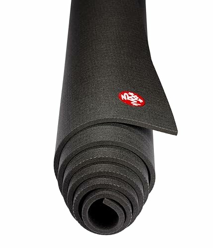 Rolled black yoga mat with logo